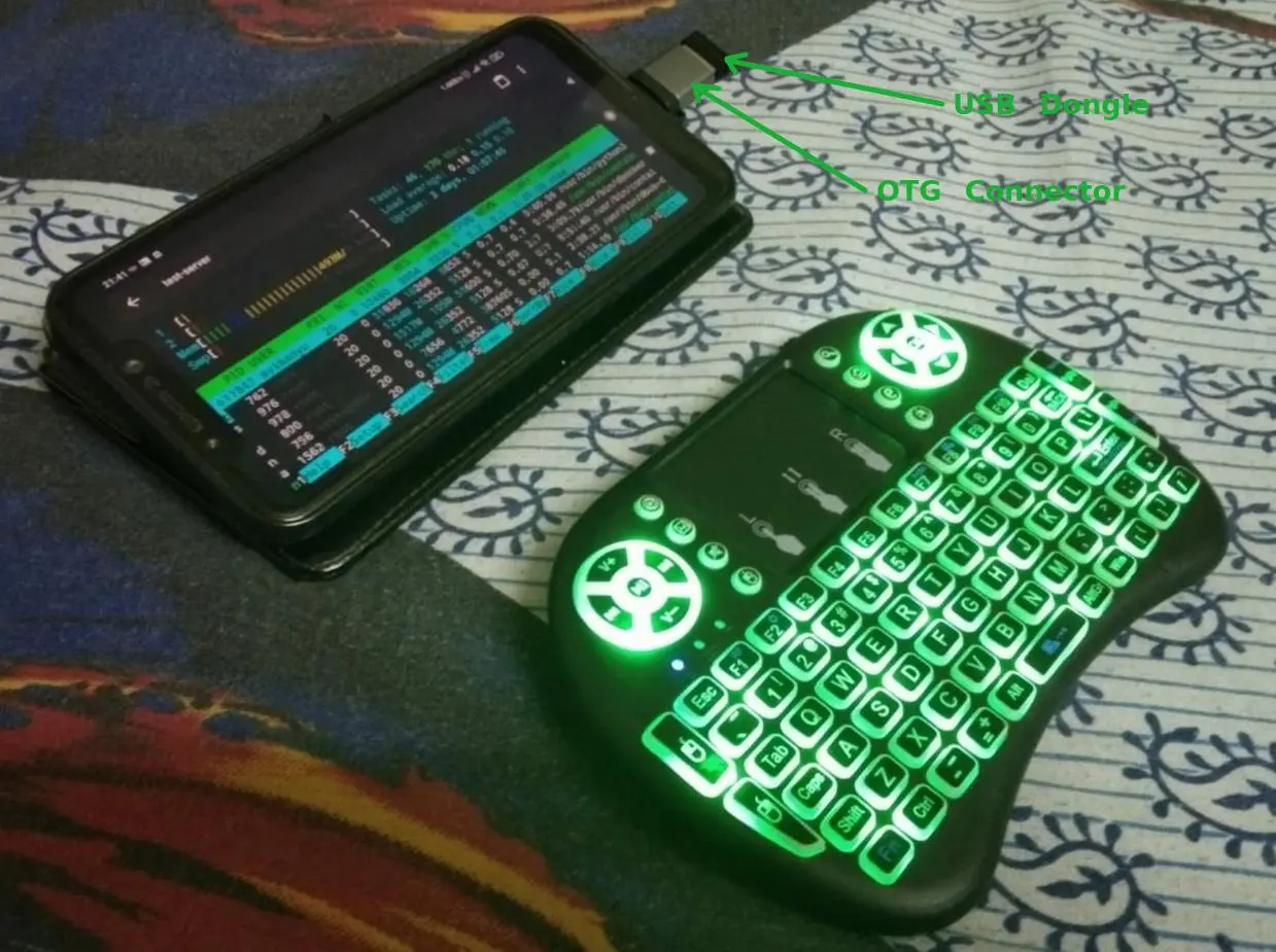 An Android Phone converted into a portable mini-workstation with the help of an OTG adapter and Wireless keyboard